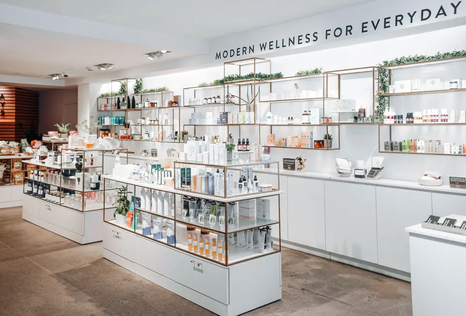 Retail shelves under a 'Modern wellness for everyday' sign at Clean Market Midtown East